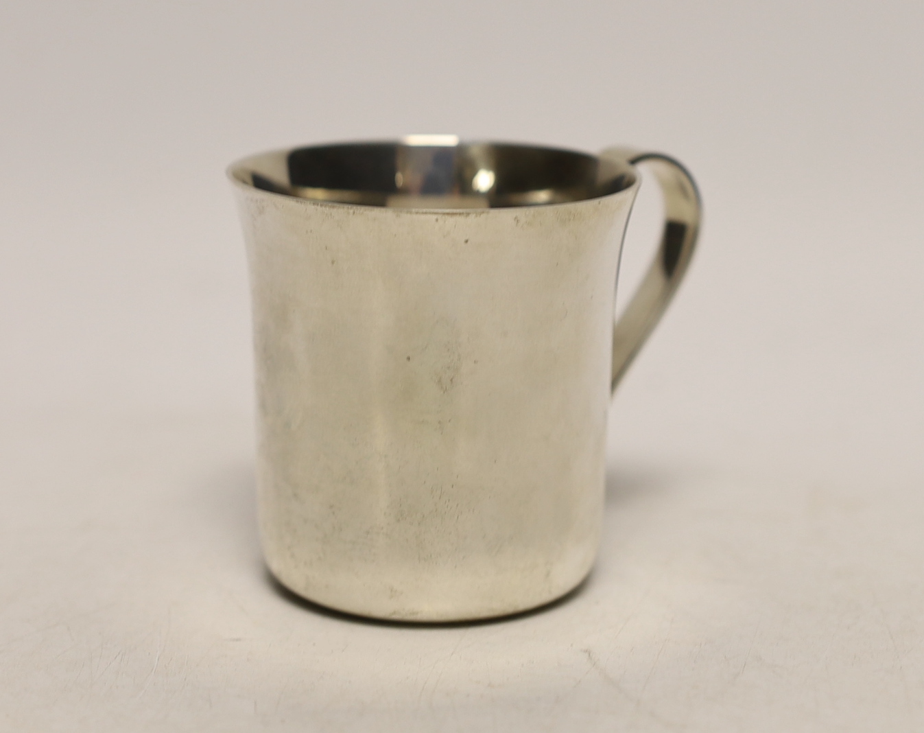 A modern Tiffany & Co sterling 925 christening mug, numbered 23245, height 6cm, 3.4oz, with Tiffany & Co box.